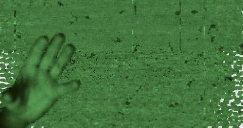Image of scary halloween pattern with screen noises over open hand Ilustração Stock