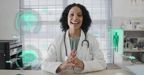 Image of science icons and data processing over biracial female doctor having Stock Photos
