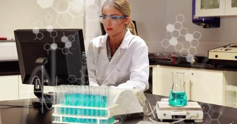 Image of scientific data processing over caucasian female scientist using 库存照片