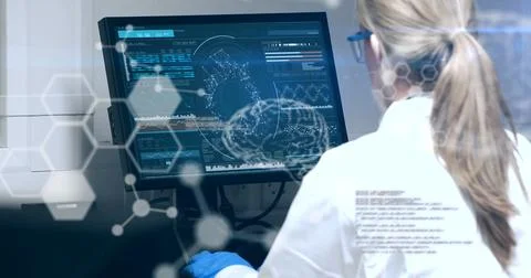 Image of scientific data processing over female scientist using computer Foto stock