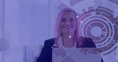 Image of scope and data processing over caucasian businesswoman using laptop Stock Photos
