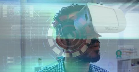 Image of scope scanning and data processing over man wearing vr headset Stock Photos