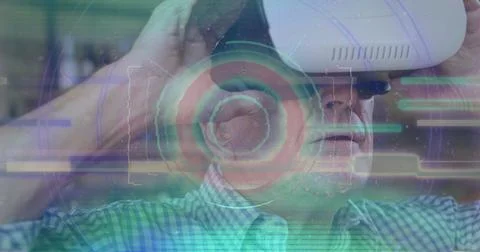 Image of scope scanning and data processing over man wearing vr headset Foto stock