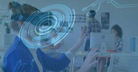 Image of scope scanning and processor elements over businesswoman wearing vr Foto stock