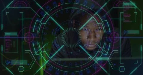Image of scope scanning over biracial male hacker using laptop Stock Photos