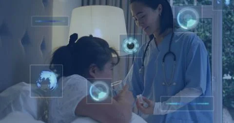 Image of scopes and data processing on screens over biracial female doctor and Foto stock