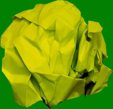 Image of scrunched up ball of yellow paper 写真素材