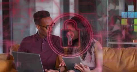 Image of security padlock and connections over diverse business people in o.. Stockfoto's