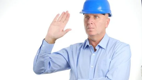 Image with Serious Engineer Making a Hello Hand Gestures 스톡 사진