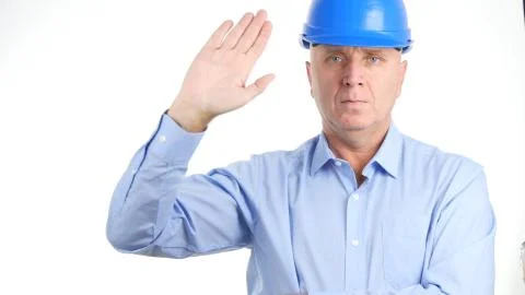 Image with Serious Engineer Making a Hello Hand Gestures 스톡 사진