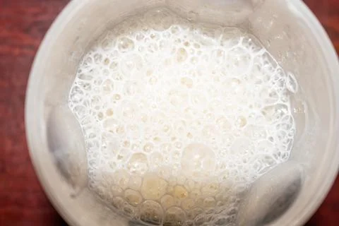 This image showcases the active fermentation process of natural leaven, essent 스톡 사진