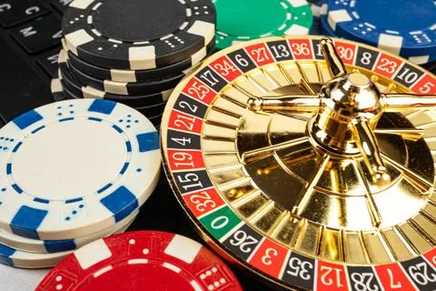 The image showcases a casino setting, with a vibrant roulette wheel and var.. Stock Photos