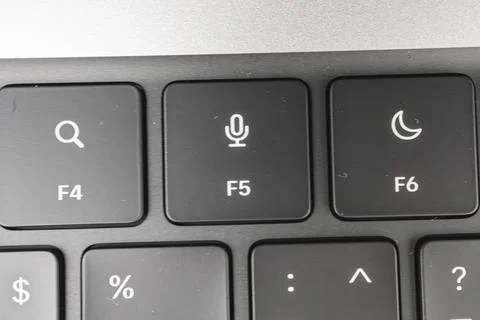 This image showcases a close-up view of a laptop keyboard, highlighting its l Stock Photos