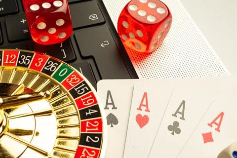 Image showcases a composite of casino elements, featuring playing cards spa.. Stock Photos