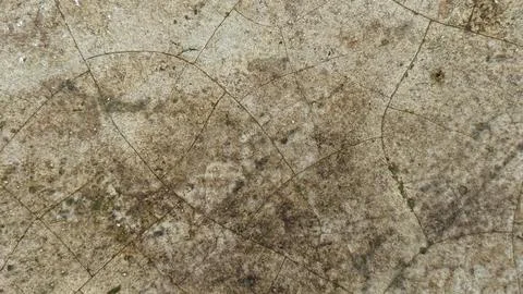 Image showcases a full frame of aged stone material, with intricate cracks fo Foto stock