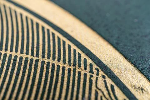 Image showcases a patterned surface with evenly spaced ridges, forming a ha.. Foto stock