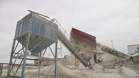 This image showcases a steel structure of an aggregate processing plant Stock Footage 314795727