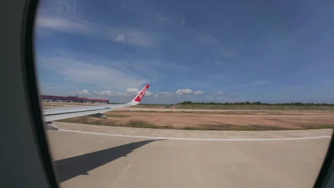The image shows a close-up of an airplane wing Stock Footage 310023300