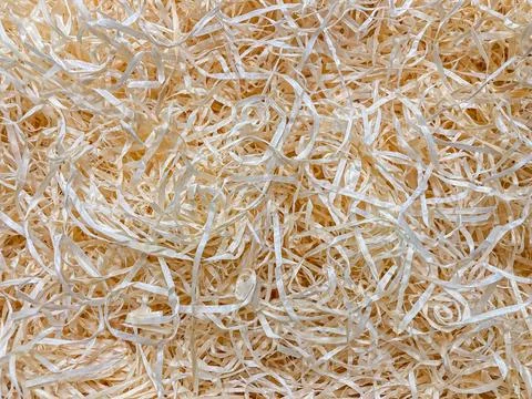 Image shows a close-up view of confetti or cut paper strips in varying sizes, Stock Photos