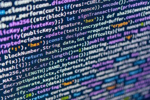 Image shows close-up view of dense computer code, likely written in a progr.. Foto stock