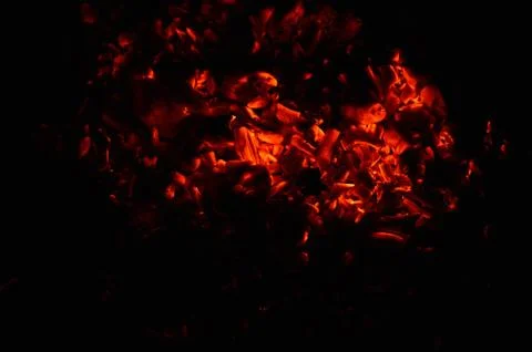 Image shows coal formed after wood is burnt in the dark. wood is the most eas Stock Photos