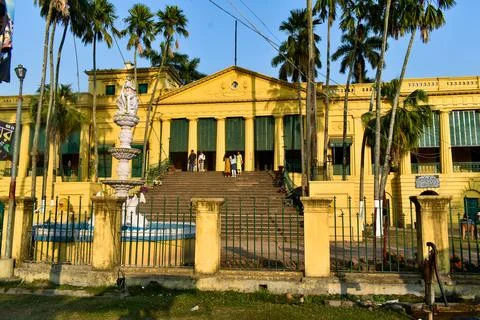 The image shows the exit pathway of the yellow Nasipur Palace. Stock Photos