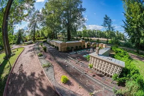 Image shows a modern complex with multiple buildings, characterized by flat.. Stock Photos