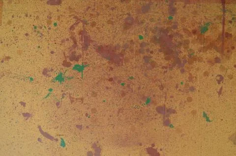 Image shows paint of different colour on brown cardboard. This was not create Stock Photos