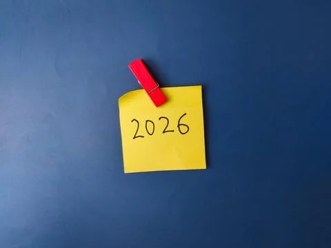 The image shows a yellow sticky note with the year2026 Stock Photos