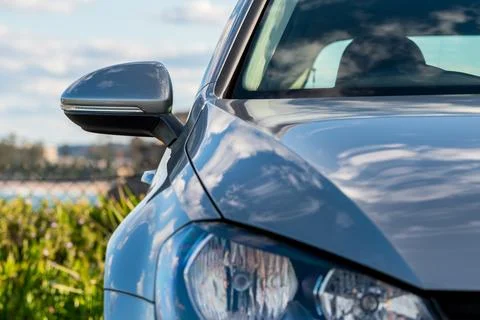 Image of the side view mirror on a modern car Stock Photos