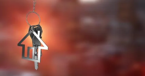 Image of silver house keys hanging against blurred background with copy space Illustrazione stock