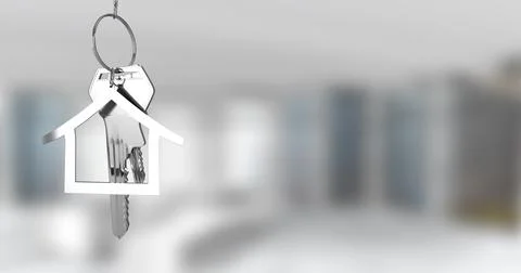 Image of silver house keys hanging against blurred background with copy space Stock Illustration