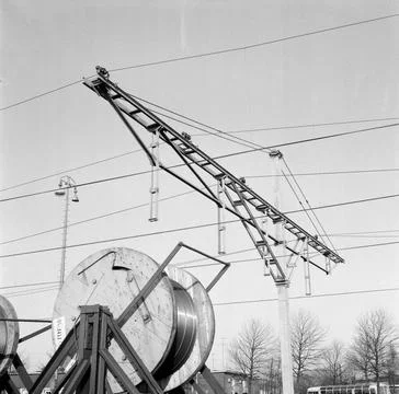 Image of a single top leader with support beam for the overhead line above... Stock Photos