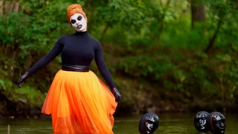 This image with skeleton-style makeup and a red bun seems to take us into the Stock Footage 286243262