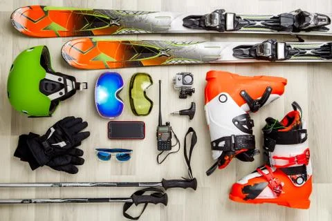 Image of skier objects on a wooden background. Stock Photos