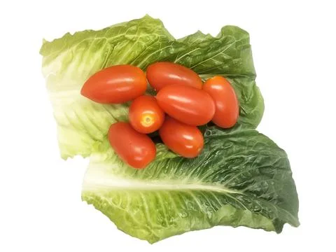 Image of small red tomatoes with green salad on white background isolate Stock Photos