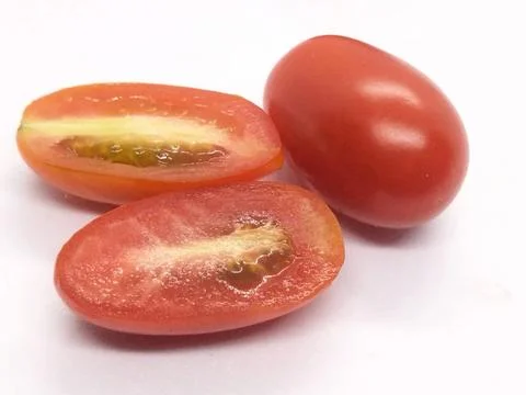Image of small red tomatoes on a white background isolate Stock Photos