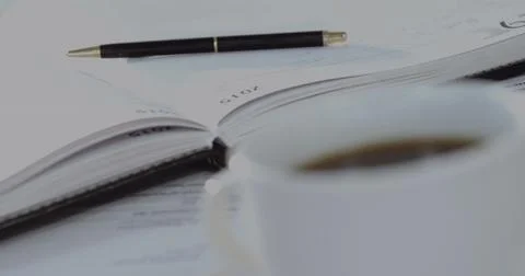 Image of smartphone icon and data processing against close up of a coffee cup 스톡 사진