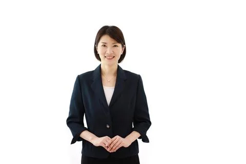 Image of a smiling female employee Stock Photos
