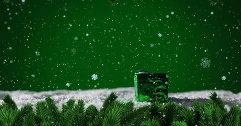 Image of snow falling over christmas present Ilustração Stock