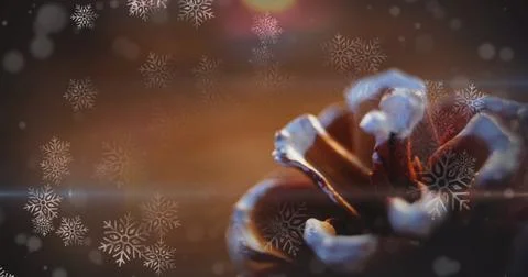 Image of snow falling over christmas decorations Stock Illustration