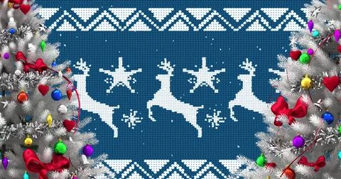 Image of snow falling over christmas baubles on trees decoration on blue Ilustração Stock