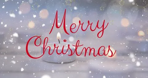 Image of snow falling over merry christmas text banner against burning candle 스톡 사진