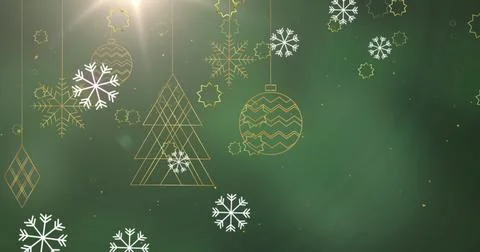 Image of snowflakes falling over hanging decorations and light spot against Ilustração Stock