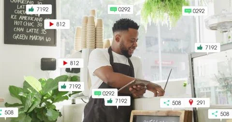 Image of social media data processing over biracial sales man in grocery stor 写真素材