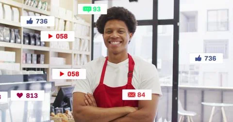 Image of social media data processing over biracial sales man in grocery stor Stock Photos