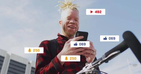 Image of social media data processing over albino man on smartphone 写真素材