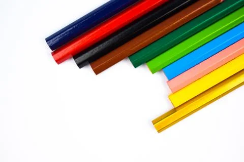 Image of some different colored wood pencil crayon placed on a white backgrou Stock Photos