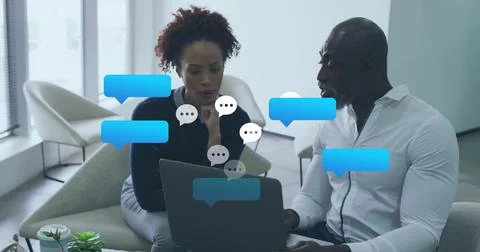 Image of speech bubbles icons over diverse business people 스톡 사진