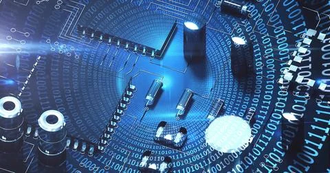 Image of spinning globe over computing board and binary coding 库存照片